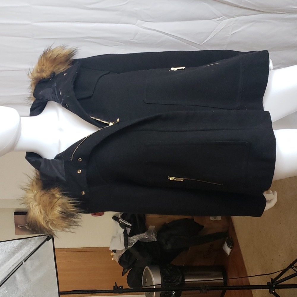 Winter jacket with hood.  Hood is held on by snaps so you can wear without hood